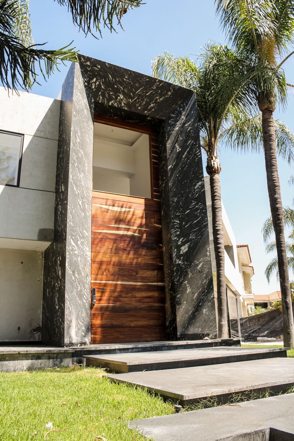High-Security Parota Doors “Valle Real” — project photo