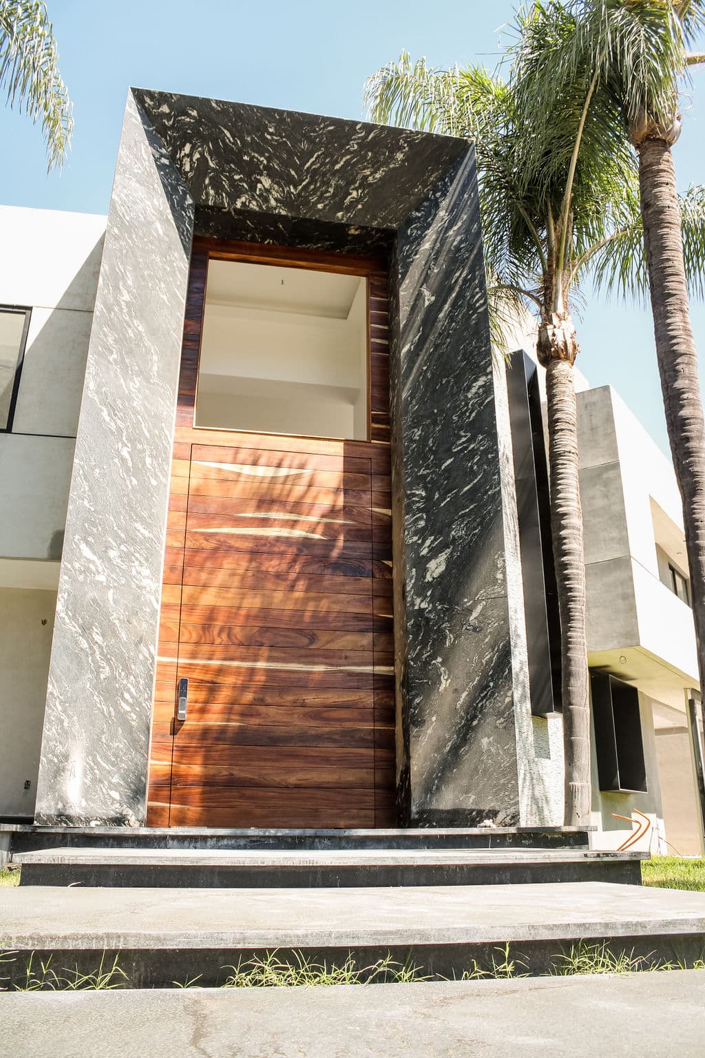 High-Security Parota Doors “Valle Real” — project photo