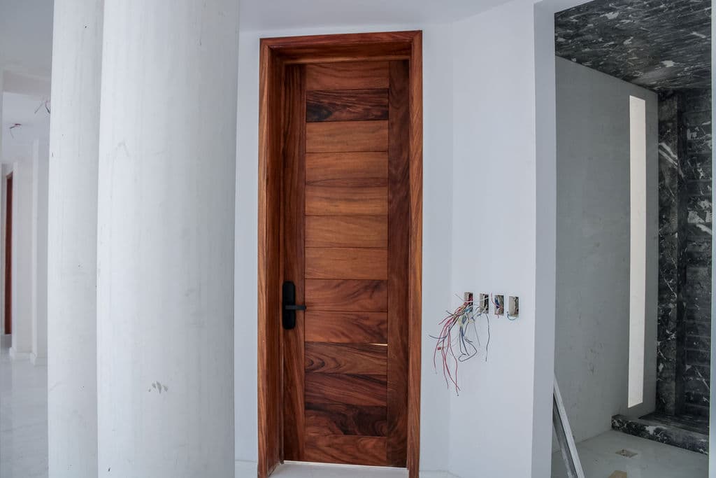 High-Security Parota Doors “Valle Real” — project photo